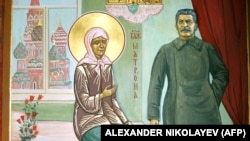 RUSSIA – Picture taken on November 29, 2008 shows a Russian Orthodox icon that includes a depiction of Soviet Dictator Josef Stalin at a St. Olga's Church outside St. Petersburg.