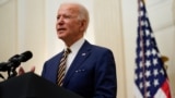 President Joe Biden delivers remarks on the economy in the State Dining Room of the White House, Friday, Jan. 22, 2021, in Washington. (AP Photo/Evan Vucci)