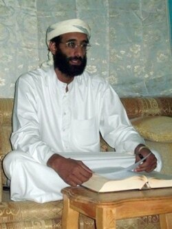 FILE - Anwar al-Awlaki, an al-Qaida supporter, is seen this SITE Intelligence Group handout photo obtained Nov. 10, 2009.