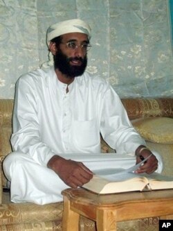 FILE - Anwar al-Awlaki, an al-Qaida supporter, is seen this SITE Intelligence Group handout photo obtained Nov. 10, 2009.