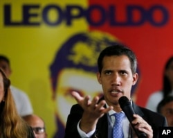 Venezuela's self-proclaimed interim president Juan Guaido, speaks during a news conference at the Voluntad Popular party headquarters in Caracas, Feb. 18, 2019.