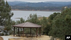 A picnic area is seen along Lake Berryessa with parts of California's newest national monument, Berryessa Snow Mountain, in the background, July 10, 2015.