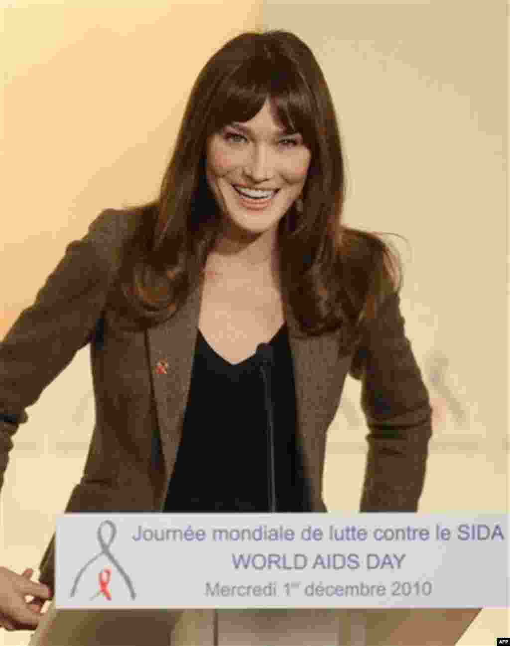France's first lady Carla Bruni-Sarkozy speaks during a news conference for World AIDS Day at the Marigny hotel in Paris, Wednesday Dec. 1, 2010. (AP Photo/Benoit Tessier, Pool)