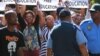 FILE - Protesting university students demand free education during a rally in Cape Town, South Africa, Oct. 22, 2015.