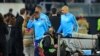 Patrice Evra, au centre, quittant l'ère de jeu après un incident avec un supporter avant le match Guimaraes - OM en Eourpa League au stade Afonso Henriques, le 2 novembre 2017. AFP PHOTO / MIGUEL RIOPA