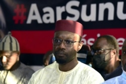 Senegalese's opposition leader Ousmane Sonko, charged with rape, talks to media at his party's headquarters in Dakar on March 8, 2021, after being freed from detention.