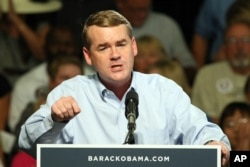 Sen. Michael Bennet D- Colo., speaks speaks to supporters at a campaign stop for President Barack Obama in Grand Junction Colo., Aug. 8, 2012.