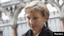 Marina Litvinenko, the widow of murdered KGB agent Alexander Litvinenko, leaves the High Court in central London, July 28, 2015.