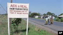 Road sign in Zambia urging AIDS awareness.