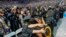 FILE - UCLA students celebrate during a commencement ceremony inside Pauley Pavilion on UCLA campus, in Los Angeles, June 14, 2024.