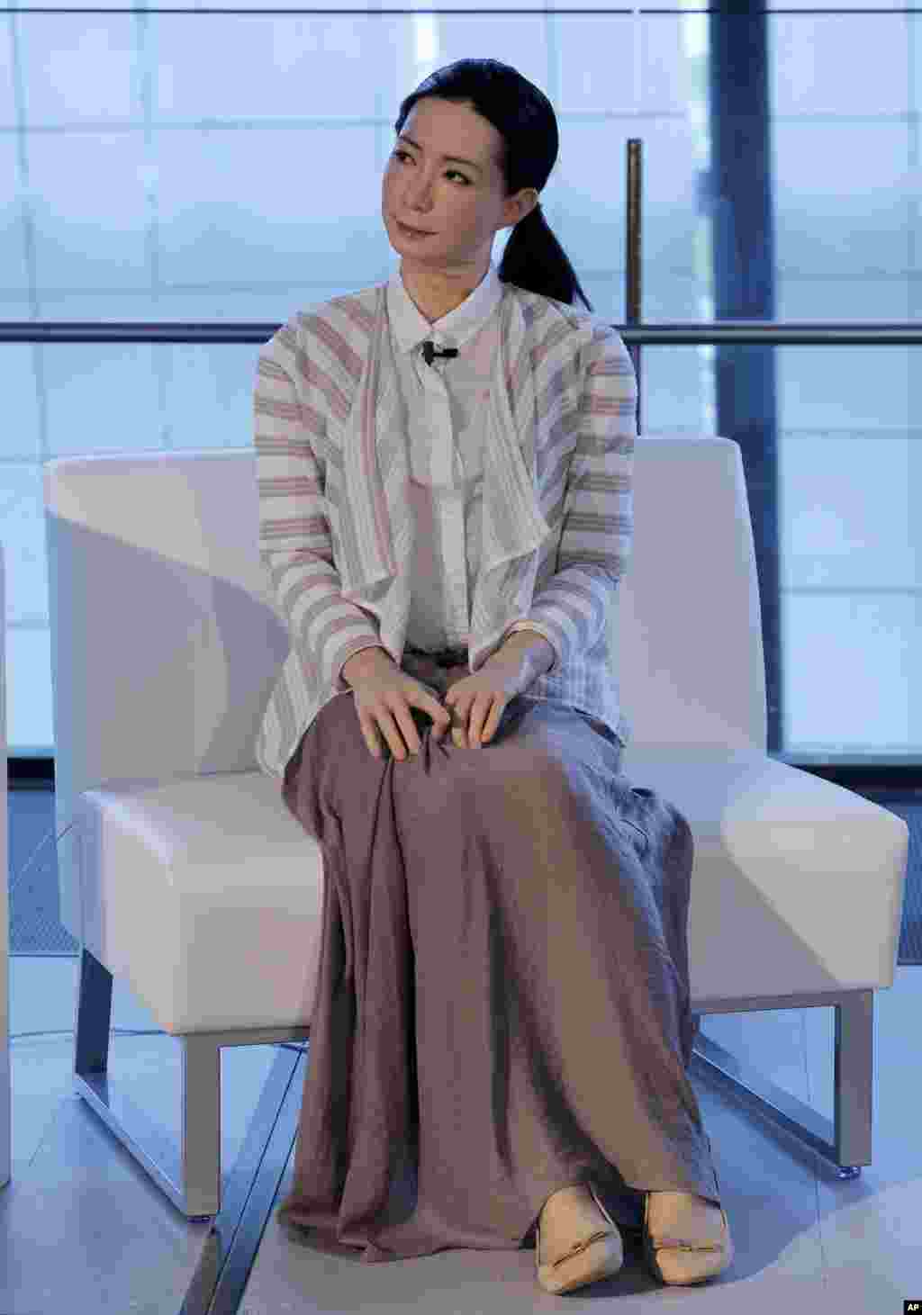 A female-announcer robot called Otonaroid speaks during a press event at the National Museum of Emerging Science and Innovation Miraikan in Tokyo, Japan. The latest creations from Japanese android expert Hiroshi Ishiguro are the Otonaroid, a girl robot called Kodomoroid and Telenoid, a hairless mannequin head with pointed arms that serves as a cuddly companion.