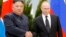 Russian President Vladimir Putin, right, and North Korea's leader Kim Jong Un shake hands during their meeting in Vladivostok, Russia, Thursday, April 25, 2019.