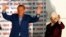 Turkey's Prime Minister Recep Tayyip Erdogan celebrates his election victory flanked by his wife Ermine in front of his party's headquarters in Ankara, August 10, 2014.