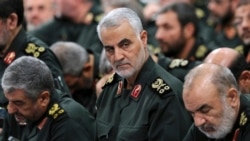 FILE - Revolutionary Guard Gen. Qassem Soleimani, center, attends a meeting in Tehran, Iran, Sept. 18, 2016.