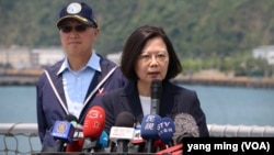 FILE - Taiwan's President Tsai Ing-wen speaks after inspecting navy exercises at Suao naval station, in Yilan County, northeast of Taiwan, April 13, 2018. 