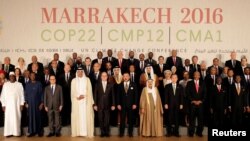 World leaders pose for a family photo at the UN Climate Change Conference 2016 (COP22) in Marrakech, Morocco November 15, 2016. REUTERS/Youssef Boudlal