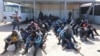 Mandats d'arrêt contre plus de 200 trafiquants de migrants en Libye