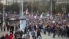 Belarusian opposition supporters walk during a rally to reject the presidential election results in Minsk, Belarus, Nov. 1, 2020. 