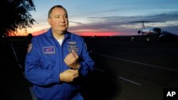 Director General of the Russia state corporation Roscosmos Dmitry Rogozin walks in Baikonur airport, in Kazakhstan, Oct. 11, 2018.