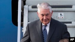 US Secretary of State Rex Tillerson steps out of a plane upon arrival in Moscow's Vnukovo airport, Russia, April 11, 2017. 