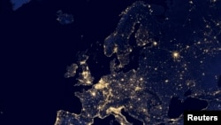 FILE - A nighttime view of Europe and North Africa is seen in a global composite assembled from data acquired by the Suomi National Polar-orbiting Partnership (Suomi NPP) satellite in 2012 and released by NASA Oct. 2, 2014.