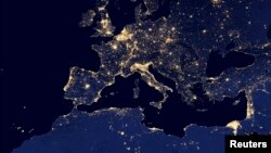 FILE - A nighttime view of Europe and North Africa is seen in a global composite assembled from data acquired by the Suomi National Polar-orbiting Partnership (Suomi NPP) satellite in 2012 and released by NASA Oct. 2, 2014.