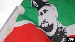 FILE - A flag depicts Ramzan Kadyrov, the Kremlin-backed president of Russia's predominantly Muslim province of Chechnya.