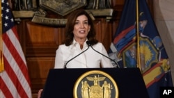 New York Gov. Kathy Hochul speaks to reporters after a ceremonial swearing-in ceremony at the state Capitol, Tuesday, Aug. 24, 2021, in Albany, N.Y. (AP Photo/Hans Pennink)