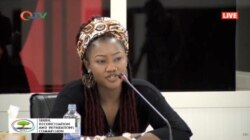FILE - Fatou "Toufah" Jallow testifies before the Truth, Reconciliation and Reparations Commission in the Gambia, Oct. 31, 2019.