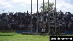 Spectators cheer for their one of four teams from different tribes as they compete for prizes and bragging rights.