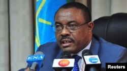 FILE - Hailemariam Desalegn, Prime Minister of Ethiopia, addresses a news conference from his office in Ethiopia's capital Addis Ababa.