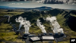 In this undated image provided by Climeworks AG shows a geothermal power plant near Reykjavik, Iceland. The Iceland plant, called Orca, is the largest such facility in the world, capturing about 4,000 metric tons of carbon dioxide per year. (Arni Saeberg/