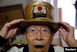 Naotoshi Yamada berpose di kantornya di Tokyo, Jepang, 3 Oktober 2018.(Foto: Reuters)