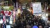 FILE - Iranians shop at Tehran's old main bazaar, Jan. 20, 2014