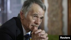 FILE- Crimean Tatars leader Mustafa Dzhemilev during an interview with Reuters in Kyiv, Ukraine, March 15, 2014.