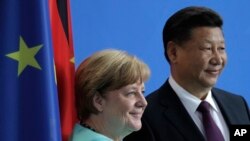 中国主席习近平和德国总理默克尔在德国总理府（2017年7月5日）