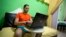 FILE - Cuban Roberto Carlos Villamar uses his laptop on a new experimental internet in the living room of his home in Havana, Cuba, Jan. 6, 2017.