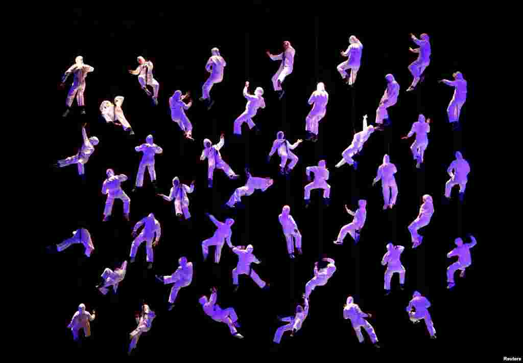 Aerobatic dancers under the direction of Spanish theatrical company La Fura dels Baus perform in &quot;The Rise of the Tritons&quot; during the opening of Valletta 2018, European Capital of Culture, in Valletta, Malta, Jan. 20, 2018.