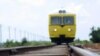 In this photo taken Wednesday, Oct. 20, 2010, a service train operated by Toll Royal Cambodia passes over a river, just south of the Cambodian capital Phnom Penh. An Australian joint venture has a 30-year lease to upgrade and operate Cambodia's railway, p