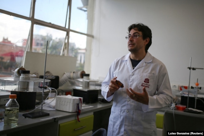 Andre Josafat Riveros, professor at the Faculty of Natural Sciences of the Universidad del Rosario, speaks during an interview with Reuters in Bogota, Colombia, October 17, 2024. (REUTERS/Luisa Gonzalez)