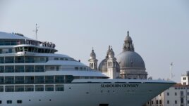 In this Sept. 27, 2014 file photo a cruise ship transits in the Giudecca canal in front of St. Mark's Square, in Venice, Italy. (AP Photo/Andrew Medichini)