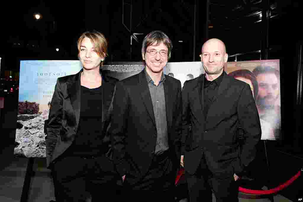 Philippe Falardeau (center), director of the Oscar-nominated film "Monsieur Lazhar" in the Foreign Language Film Award category for the 84th Academy Awards attends a reception in the Grand Lobby of the Samuel Goldwyn Theater in Beverly Hills, CA on Friday