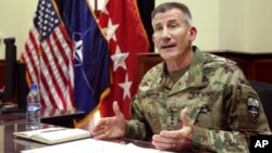 Head of NATO and U.S. forces in Afghanistan, U.S. Army Gen. John W. Nicholson, speaks during an interview, in Kabul, July 27, 2016. Nicholson's recent comments concerning Russian, Iran and Taliban has prompted a promise of an investigation by the Afghan Senate.