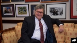President Donald Trump's attorney general nominee, William Barr, meets with Senate Judiciary Committee member and Trump confidant Sen. Lindsey Graham, R-S.C., on Capitol Hill in Washington, Jan. 9, 2019.