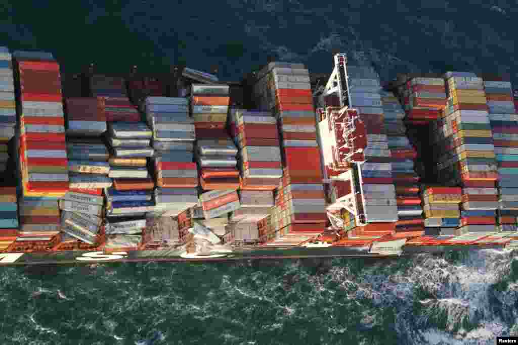 A handout aerial photo made available by the Dutch Coastguard shows the container ship MSC ZOE. Up to 270 containers had fallen off the Panamanian-flagged MSC ZOE, one of the world&#39;s biggest container ships, in rough weather near the German island of Borkum and floated southwest toward Dutch waters.