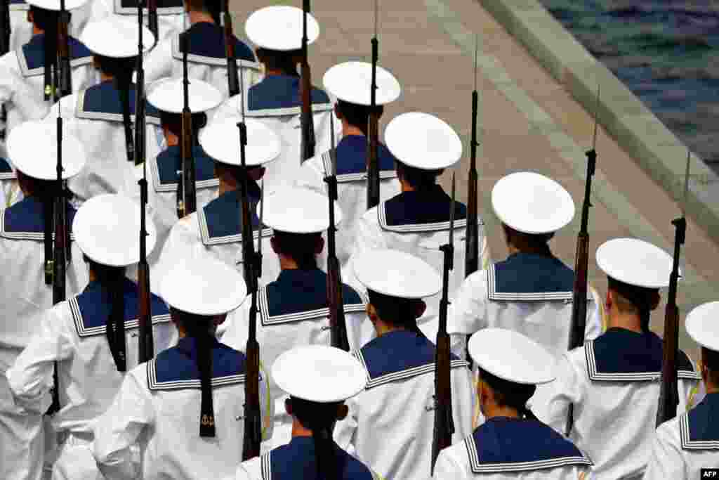 Sailors of the Russian Black Sea Fleet march as they prepare for Navy Day celebrations in the Crimean city of Sevastopol. Russia announced Wednesday that it had begun expanding and modernizing its Black Sea fleet based in Crimea with new ships and submarines.