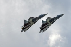 FILE - Two Russian Air Force Sukhoi SU-57 warplanes are seen in a July 23, 2017, photo.