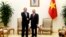 North Korean Foreign Minister Ri Yong Ho, left, poses with Vietnamese Prime Minister Nguyen Xuan Phuc for a photo during a meeting at the Government Office in Hanoi, Vietnam, Saturday, Dec. 1, 2018.