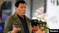 FILE - Philippine President Rodrigo Duterte speaks during a visit in Baguio city, Philippines, March 11, 2017. 