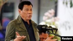 FILE - Philippine President Rodrigo Duterte speaks during a visit in Baguio city, Philippines, March 11, 2017. 